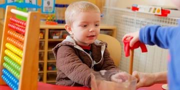 Boy playing at nursery