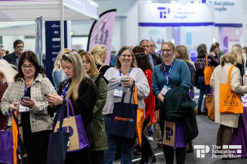 Delegates at exhibition smiling